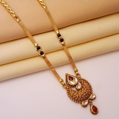 For most brides in India, there is no wedding without the MangalSutra. Select from our exclusive collection of mangalsutra chains Designs. Mangalsutra Chain Gold, No Wedding, Kalyan Jewellers, Mangalsutra Chain, Gold Mangalsutra Designs, Gold Mangalsutra, Mangalsutra Designs, Antique Pendant, Stone Studs