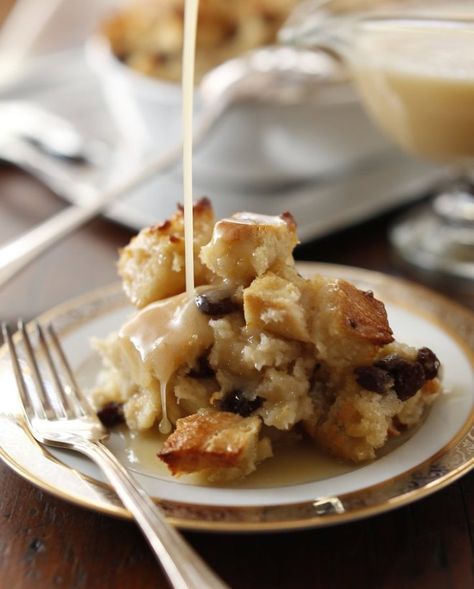 New Orleans Bread Pudding with Whiskey Sauce. A beloved family tradition Hot Butter Rum, Irish Bread Pudding, Butter Rum Sauce, Irish Bread, Rum Sauce, Butter Rum, Pinch Of Yum, Bread Pudding Recipe, Oatmeal Raisin Cookies