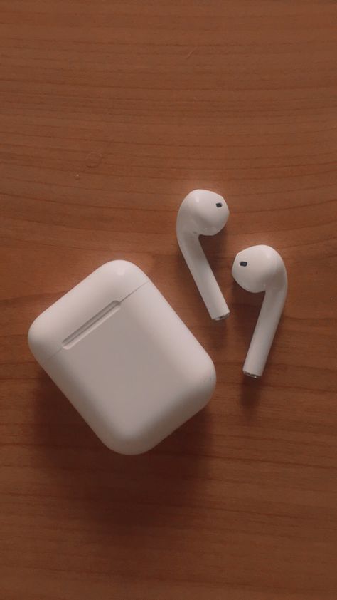 White AirPods 
White case
Brown table
Aesthetic AirPods Phone And Earphones Aesthetic, Airpods Aesthetic Wallpaper, Airpods 2 Aesthetic, Air Pods Aesthetic, Earphone Aesthetic, Airpod Aesthetic, Deepavali Message, Earphones Aesthetic, Airpods Aesthetic