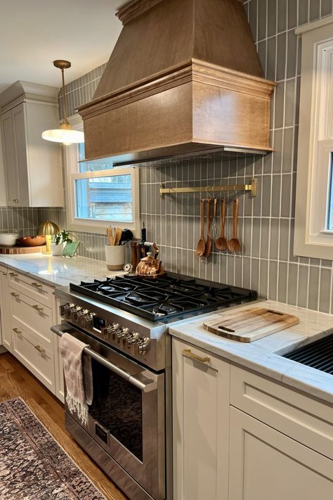 Soft Beige makes a BIG impact in this cozy neutral kitchen by designer Suzanne: stacked gray subway tile provides the contrasting backdrop while the woodgrain hood offers a warm focal point. White And Navy Kitchen, Stacked Cabinets, Gray Subway Tile, Navy Blue Kitchen Cabinets, Kitchen Cabinets Grey And White, Beige Kitchen Cabinets, 10x10 Kitchen, Beige Cabinets, Navy Kitchen