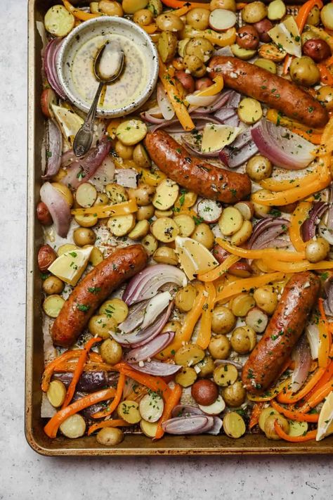 Our quick and simple sheet pan sausage and veggies recipe is a healthy, easy to prepare, 30 minute meal. It's Whole30 compliant and packed with flavor! GF, DF #wellseasonedstudio #sheetpan #sheetpandinner #sheetpanmeal #sausageandveggies #sheetpansausage #italiansausage #spicysausage Sheet Pan Sausage And Veggies, Pan Sausage And Veggies, Sheet Pan Sausage, Pan Sausage, Sausage And Veggies, Sheet Pan Suppers, Recipe Sheets, Sausage And Peppers, Spicy Sausage