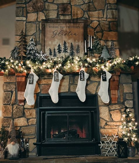 Where the Treetops Glisten #Christmas #CabinChristmas #FarmhouseChristmas #ChristmasDecor #ChristmasDecorating #FarmhouseChristmas #StockingTags #cozyChristmas #MantelDecor #StoneFireplaceChristmas #WhereTheTreetopsGlisten #ChristmasTree Rock Fireplace Christmas Decor, Christmas Stone Fireplace Decor, Stone Fireplace Christmas Decor, Christmas Fireplace Decorations With Tv, Christmas Mantle Decor Fireplaces Rustic, Stone Mantle Decor, Christmas Mantle Decor Fireplaces, Rustic Christmas Mantle, Stone Fireplace Decor