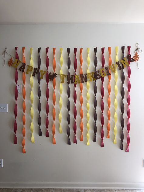 Creative, DIY, photo backdrop wall for Thanksgiving using streamers Photo Backdrop Wall, Streamers Backdrop, Thanksgiving Table Settings Diy, Thanksgiving Dinner Decor, Thanksgiving Party Decor, Friendsgiving Decorations, Thanksgiving Party Decorations, Thanksgiving Background, Thanksgiving Photos