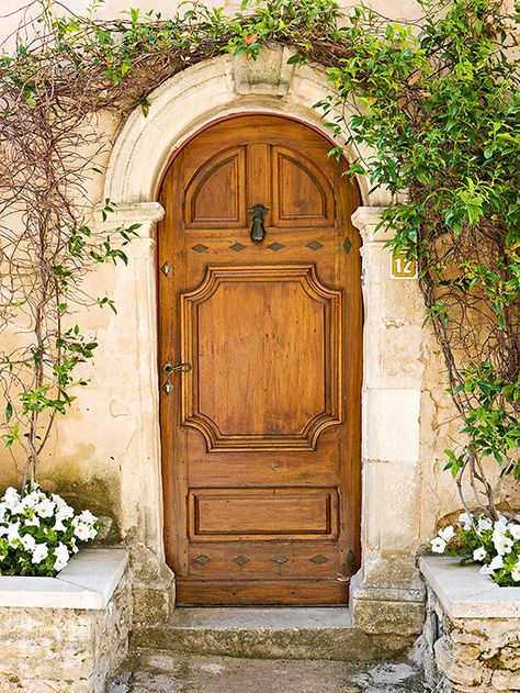 We love the subtle pattern on this gorgeous front door:  http://www.bhg.com/home-improvement/door/exterior/european-doors/?socsrc=bhgpin091114subtlepattern&page=3 Wood Doors Outdoor, Stunning Front Doors, European Style Windows, Arched Wood Front Door, Country Front Door, Door Architecture, Arched Front Door, Art Door, Door Exterior