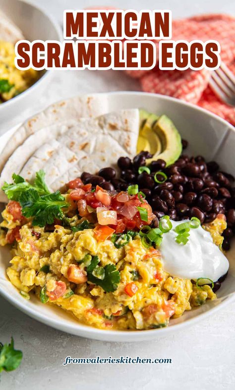 These hearty Mexican Scrambled Eggs are cooked with onions, peppers, tomato, and melted cheese. Serve them with creamy avocado, warm black beans, and toasted flour tortillas for a protein-rich start to your day or an easy breakfast for dinner choice! Easy Breakfast For Dinner, Toasted Flour, Mexican Scrambled Eggs, Breakfast Beans, Breakfast Bowls Recipe, Dinner Choices, Black Bean Recipes, Eggs In Peppers, Mexican Breakfast