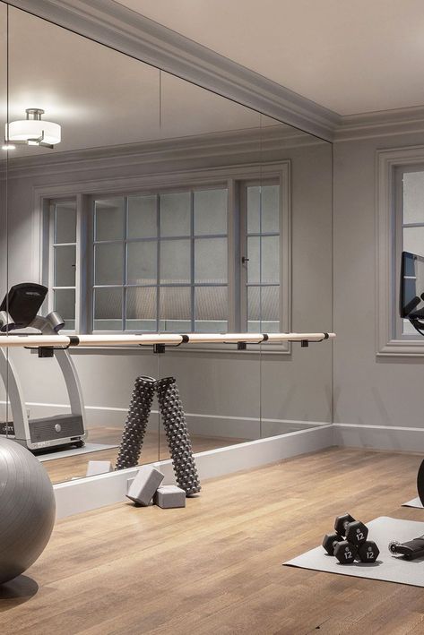 modern gray home gym Full Wall Mirror Gym, Basement Gameroom And Gym, Home Gym Stair Master, Exercise Room Mirrors, House Gym Room Small Spaces, Home Gym Wall Mirrors, Exercise Room Design, Basement Exercise Room Ideas, Chic Home Gym