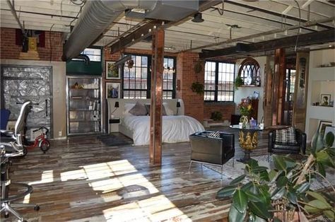 Detroit industrial loft!  Wow!  Love the windows.  Some light sheers would finish the look and provide some privacy.  #industrial #industrialdesign Loft Furniture Design, Luxury Loft Apartment, Converted Warehouse Apartment, Loft Fireplace, Modern Industrial Loft, Dream House Garden, Warehouse Apartment, Bohemian Apartment, Warehouse Living