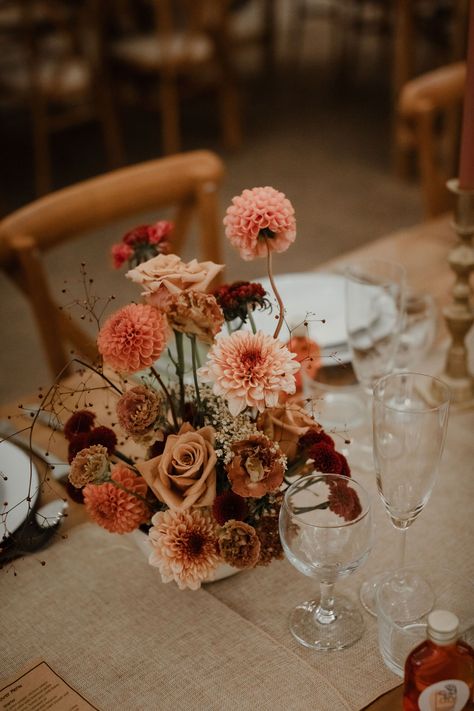 Autumnal wedding flowers positioned using a bowl and floral frog. Rustic wedding table setting with cross back chairs. Caro Weiss Photography Pink Autumn Wedding, Autumnal Wedding Flowers, Bodrum Wedding, Autumn Wedding Table, Rustic Wedding Table Setting, Floral Frog, Scotland Photography, Table Floral Arrangements, Cow Shed