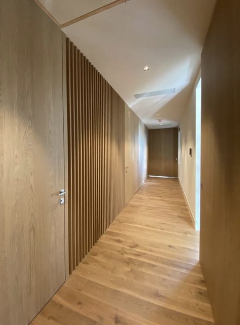 Flush doors and slatted claddings in beautoful lught oak goves light amd prestoge tonthis amazong large hallway Wooden Slats Hallway, Wood Slat Hallway, Hallway Door, Large Hallway, Stair Lights, Wood Slat Wall, Condo Design, Door Detail, Flush Doors