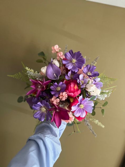 "This romantic silk wedding bouquet is made from faux purple cosmos and hot pink peonies, silk eucalyptus, faux ferns. It will make the perfect addition to your big day!  The stems are wrapped in twine. The bouquet pictured is 10\"  Matching bridesmaids bouquets, toss bouquet, corsages and boutonnières and other accessories are available." Light Pink And Purple Bouquet, Purple Dress Bouquet, Pink And Purple Prom Bouquet, Pink And Purple Bridal Bouquet, Prom Bouquet Purple Dress, Prom Flowers Bouquet Purple Dress, Prom Bouquet Ideas Purple, Purple Prom Bouquet, Purple Prom Flowers