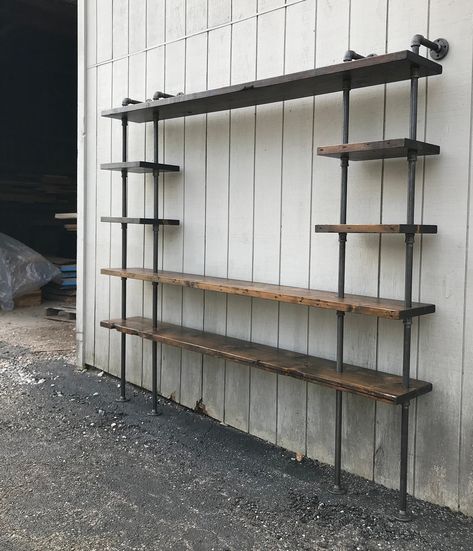 Industrial Pipe Shelving Around Tv, Shed Office Shelves, Loft Shelves Attic Storage, Living Room Pipe Shelves, Bookshelves Around Wall Mounted Tv, Tv And Bookshelf Wall Floating, Scaffold Tv Stand, Short Tv Stand Styling, Pantry Shelves With Pipes