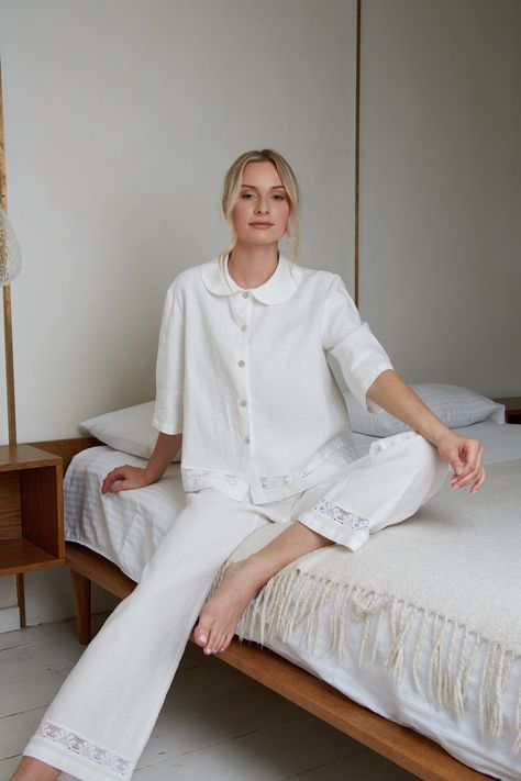 Most adorable linen pajama set for women in white eco linen. The linen loungewear luxury with delicate cotton lace Nice trapeze style short jacket with Peter pan collar and long pants with delicate cotton lace decoration at jacket and pants bottoms. This stunning  pajama you can buy as a wedding, birthday or anniversary gift. ITEM DETAILS: Jacket: - Short trapeze shape jacket   - Buttoned down front  - Peter Pan style collar - 3/4 length sleeves - Jacket back length - 23" (58.5cm) - At jacket bo Elegant Pajamas Classy, Cotton Pyjama Set Women, Cute Pajamas Set, Luxury Pajamas Aesthetic, Lounge Wear For Women, Wedding Day Pajamas, Old Money Pajamas, Organic Loungewear, Classy Pajamas