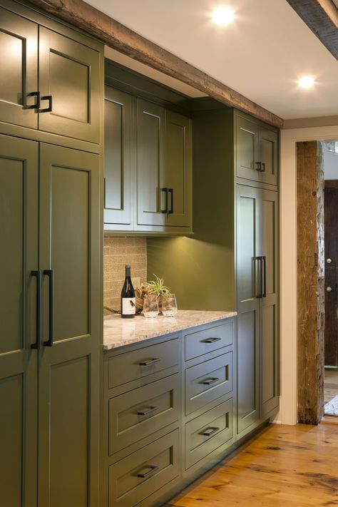 This butlers' pantry features avocado-green colored cabinets - tall cabinets on both sides of a set of six drawers. A marble countertop with tile backsplash tops the set of drawers. A wine bottle, two glasses and a small succulent rest on the countertop. Avocado Cabinets, Butlers Pantry Walk Through, Mud Closet, Historic Farmhouse, Floor To Ceiling Cabinets, Exterior Kitchen, Open Kitchen And Living Room, Princeton New Jersey, Butler’s Pantry