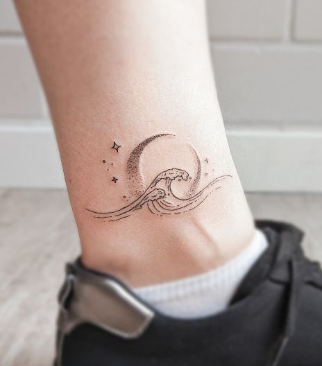 Ocean Wave Mini Tattoos Of Moon And Stars Crescent Moon And Waves Tattoo, Water Tattoo Ideas Simple, Complex Tattoos Design, Wave With Moon Tattoo, Moon And Ocean Tattoo Designs, Star And Ocean Tattoo, Wave Tattoo On Collar Bone, Moon And Water Tattoo Designs, Sun Moon Stars Ocean Tattoo