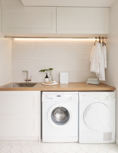 This stylish laundry will make you want to do the washing White And Wood Utility Room, Laundry Room White And Wood, Laundry White And Wood, Laundry Room Ideas Medium Size, Small Utility Room Ideas With Sink, Small Utility Room Ideas Hanging Clothes, Small White Laundry Room, Small Utility Room With Sink, Small Laundry With Sink