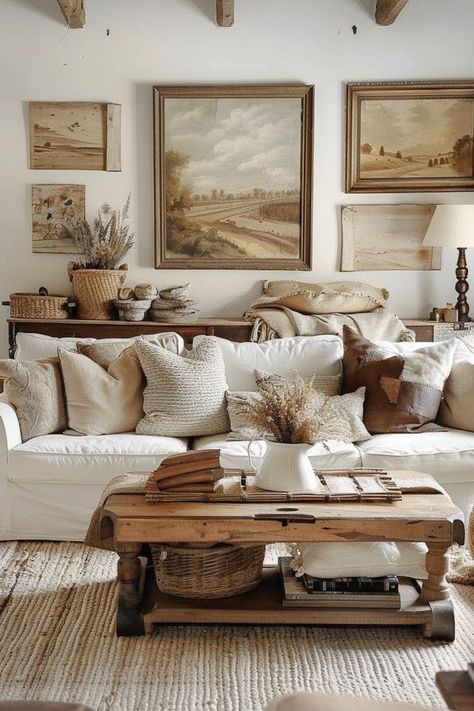 Explore living room wall art layout ideas that create a cozy and inviting atmosphere. Embrace vintage and rustic elements for a warm space. 🌿✨ Country Home Living Room Decor, Clean Home Decor Ideas, Natural Vintage Interior, Beige Cottage Living Room, Sophisticated Country Decor, Cottagecore Interior Living Room, Cozy Cottage Living Room Farmhouse Style, Farmhouse Wall Decor Ideas Living Room, Living Room Cottage Decor