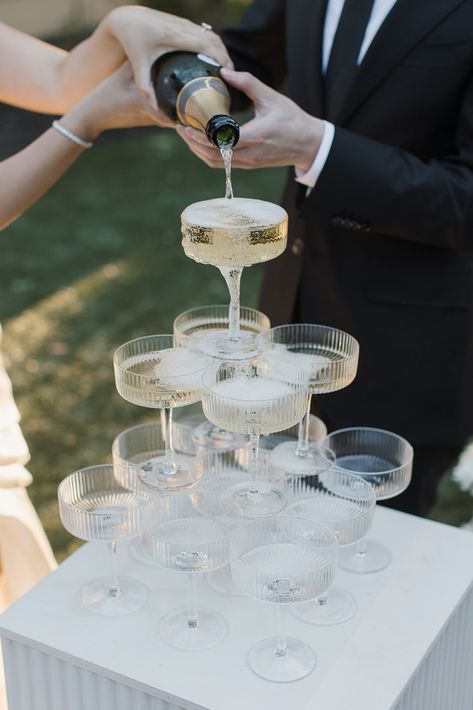 Wedding champagne tower Champagne Tour Wedding, Champagne Tower Wedding Diy, Champagne Wedding Tower, Outdoor Champagne Tower, Small Champagne Tower Wedding, Champagne Pour Wedding, Diy Champagne Tower, Champagne Tower Diy, Mini Champagne Tower