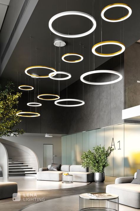 The luminaire is dedicated to rooms with large cubic capacity. It will emphasise the prestige of hotel spaces, reception areas, modern shopping malls, large conference rooms and other spacious representative rooms.. #interiordesign #designinterior #architecturedesign #designinspiration #designlovers #interiordesign #interiorlovers #interiorstyling #contemporarydesign #officelamp #light #ledlight #interior #swiatlo #architecture #contemporary #lighting #solanto #lenalighting #seemore Chandelier For Reception Area, Modern Reception Area Interior Design, Office Ceiling Lights, Lobby Lighting Design, Modern Reception Area, Modern Office Lighting, Reception Ceiling, Reception Lighting, Commercial Lighting Fixtures