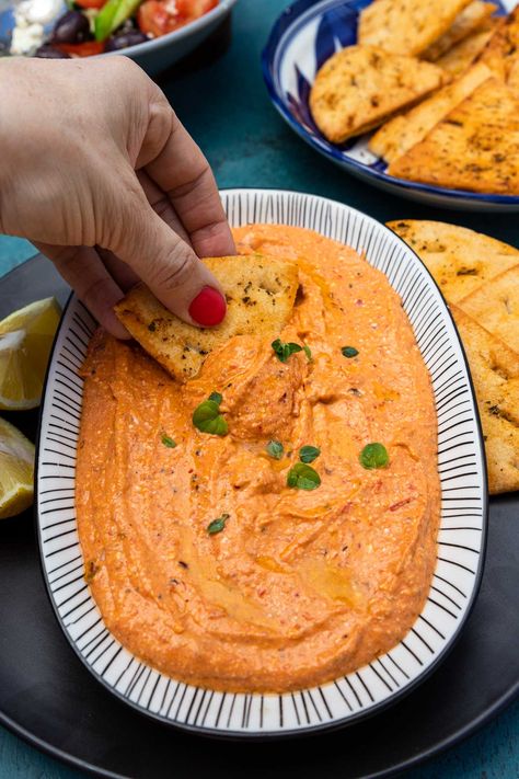 Your new favorite cold dip. Tyrokafteri is a tangy, salty, zesty and delicious 5-minute 5-ingredient Greek spicy feta dip. Perfect for mezze platters, appetizers & more! Fire Feta Recipe, Greece Themed Party, Spicy Feta Dip, Greek Appetizer, Spicy Feta, Homemade Pita Chips, Greek Appetizers, Greek Dinners, Feta Recipes