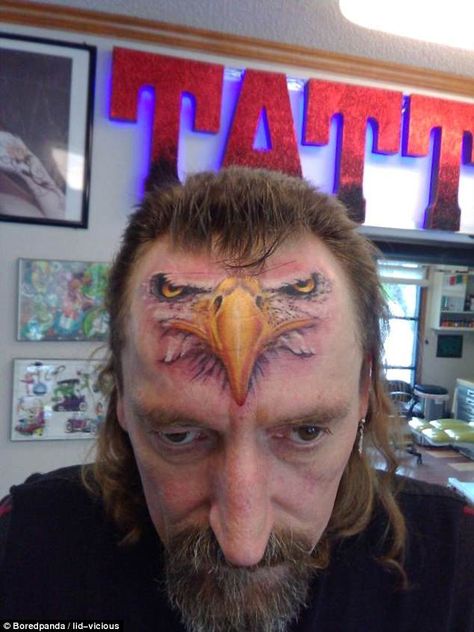 That's certainly eye-catching! This  man got the face of an eagle inked right across his forehead Neck Tattoos, I Hope, Tattoos