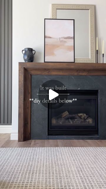 Andrea Nelson | Home Decor | Interior Decorating on Instagram: "How to DIY our fireplace mantle ⤵️

I get messages from people requesting the link to our mantle regularly. 

It’s custom built by professional finish carpenters, but I’m going to give you all the info to DIY.

We had the BEST finish carpenters in all the land @awesometrimwork working on our home, and they custom built our mantle for a look we loved and so that we could match it to the wood beam and kitchenette wood stain we put in down there.

So… I reached out to thfor the details, and here’s what they said:

“We built the mantle using Clear Alder. It’s a pretty simple but sleek design. We ordered a 6” cove crown moulding from a local mill and ran that on the inside of our outer box. Then added a cleat for the inside of the Entry Way With Fireplace, Flat Fireplace Mantle, Wood Over Fireplace Mantel, Fireplace On Flat Wall Ideas, Fireplace Trim Diy, Wood Mantle Surround, Plaster Fireplace Wood Mantle, Diy Corner Fireplace Mantle, Marble Fireplace With Wood Mantle