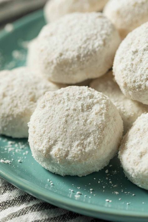 Also known as Mexican wedding cakes, these delicious Mexican Wedding Cookies are soft, sweet, and melt in your mouth. They’re delicately flavored with vanilla, and the crushed pecans add a delicate crunch. Mexican Wedding Cakes, Mexican Wedding Traditions, Authentic Mexican Desserts, Mexican Wedding Cookies Recipes, Traditional Mexican Desserts, Wedding Cookies Recipe, Mexican Wedding Cake, Mexican Desserts, Spanish Desserts