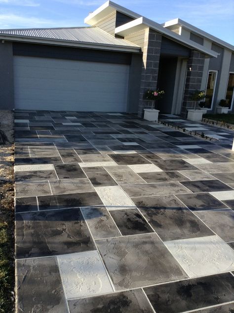 Check out this cool Stamped Concrete driveway in geometric pattern! It makes concrete visually satisfying and it provides a non-skid surface for safer and more convenient driving.  CALL (717) 245-2829 to get a FREE quote!  Sundek of PA 1787 W Trindle Rd Carlisle, PA 17015 (717) 245-2829 Entry Flooring, Decorative Concrete Driveways, Stamped Concrete Patterns, Stamped Concrete Driveway, Rock Pathway, Front Path, Cobblestone Driveway, Driveway Ideas, Concrete Patio Designs