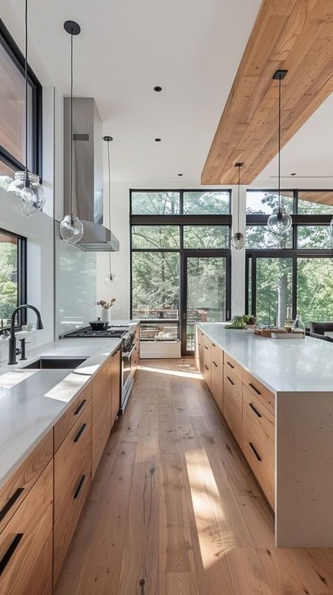 Modern Kitchen With Wood Accents, Interior Design Kitchen Minimalist, Mediterranean Minimalist Kitchen, Clean Interior Aesthetic, Chalet Kitchen Modern, Modern Natural Kitchen Design, Kitchen In Center Of House, Modern Kitchen With Wooden Floor, Modern Pnw Home