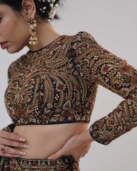 Lost in a world of forbidden luxury. This Noor-e-Mahal Lehenga Set is a masterpiece of intricate gold dabka, Zardozi and Kasab Dori embroidery, designed to tantalize and captivate. Every thread, every bead, is a secret invitation to embrace your inner siren. @_richaahluwalia introduces silhouettes drenched in the sparkles of precious embellishments for the new-age brides. Visit us at B-25, Defence Colony, New Delhi. To schedule an appointment or arrange a video call, please dial +91 8800880... Intricate Embroidery Designs, Secret Invitation, Inner Siren, Thread Work Lehenga, Blouse Embroidery Designs, Uniqlo Women Outfit, Embroidery Lehenga, Dori Embroidery, Velvet Lehenga