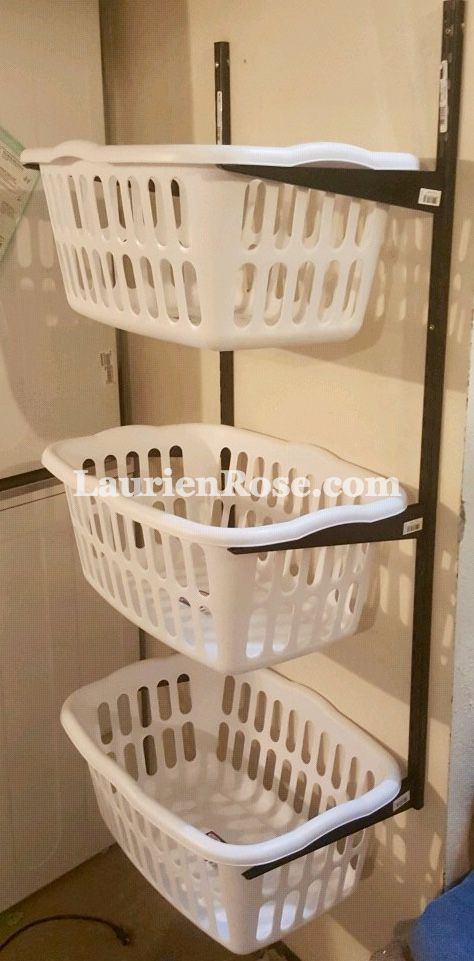 Super simple hanging laundry basket DIY to help you sort out life one load at a time. :] Laundry Basket Storage Diy, Laundry Basket Shelves, Basket On Wall, Laundry Basket Dresser, Laundry Basket Holder, Laundry Room Baskets, Diy Laundry Basket, Laundry Sorting, Hanging Laundry