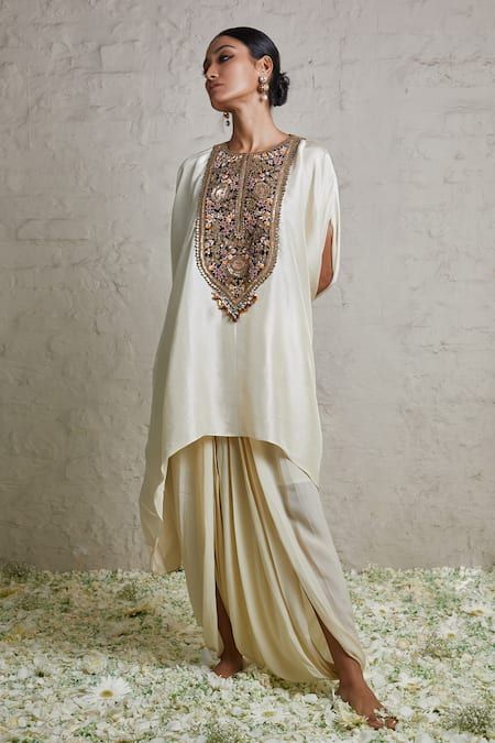 Buy Ivory Kaftan Silk Embroidered Dori Round Floral And Dhoti Pant Set For Women by Prisho Online at Aza Fashions. Kaftan With Dhoti Pants, Trending Indian Outfits, Dhoti Dresses For Women, Dhoti Salwar Suits, Fancy Dress Patterns, Gorgeous Lehengas, Kaftan Sleeves, Kaftan Pattern, Trendy Outfits Indian