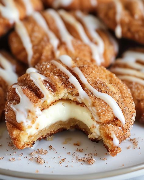 These Churro Cheesecake Dream Cookies are the ultimate treat that combines the cinnamon-sugar goodness of churros with the rich, tangy flavor of cheesecake. They're easy to make, delightful to eat, and perfect for any occasion. Every time I bake these cookies, the aroma fills the house with a warmth that makes everyone gather around the kitchen. The crispy edges, the soft center, and the surprise cheesecake filling make these cookies irresistible. Whether you're planning a cozy night in or ... Cheesecake Stuffed Cookies, Optimal Recipes, Dream Cookies, Magical Food, Cook Ideas, Churro Cheesecake, Cinnamon Cream Cheese, Stuffed Cookies, Cream Cheese Cookies