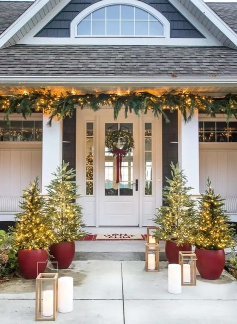 Front porch christmas decorations red planters with trees and wreath on a white front door Exterior Christmas Decorations, Exterior Christmas, Porch Columns, Winter Porch, Front Porch Christmas, Christmas Front Porch, Christmas Front Doors, Christmas Porch Decor, Front Porch Decorating