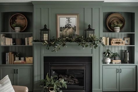 Discover 50+ inspiring ideas for stunning fireplace built-ins. Elevate your space with these tips on decor, color palettes, and designs. Custom Shelving Around Fireplace, Blue Fireplace Wall Living Room, Wall And Fireplace Same Colour, Green Tv Built In, Green Fireplace And Built Ins, Family Room With Built Ins, Coloured Fireplace Surround, Blue Built In Bookcase Fireplace, Library With Electric Fireplace