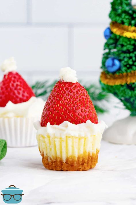 Santa Hat Mini Cheesecakes - The Country Cook Santa Hat Cheesecake Bites, Santa Hat Dessert, Summer Christmas Dessert, Christmas Mini Cheesecakes, Mini Eggnog Cheesecake, Easy Mini Cheesecake Recipe, Christmas Cheesecake Recipes, Cheesecake With Whipped Cream, Christmas Cheesecake