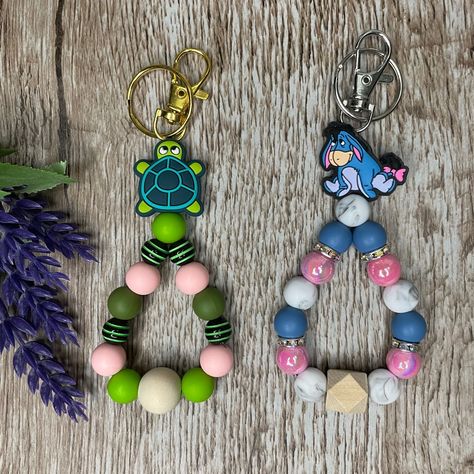 Handcrafted Artisan Brand New A Turtle & Eeyore Fingerlet Keychains For Carrying Your Keys On Your Hand Makes A Great Keychain For Keys & Purse Makes A Thoughtful Gift Customization Prices $1 Extra Per Pen $2 Extra Per Bookmark/Wristlet/Keychain To Find All Of My Beaded Products In One Place, Click The Tag Below #Melissasxcloset ***Small Beads Can Cause A Choking Hazard To Kids*** Eeyore Gift Ideas, Silicone Bead Keychain Diy, How To Make Silicone Bead Keychain, Beaded Keychain Ideas, Eeyore Gifts, Beaded Keychains Patterns, Beadable Items, Keychain Business, Bead Wristlet Keychain