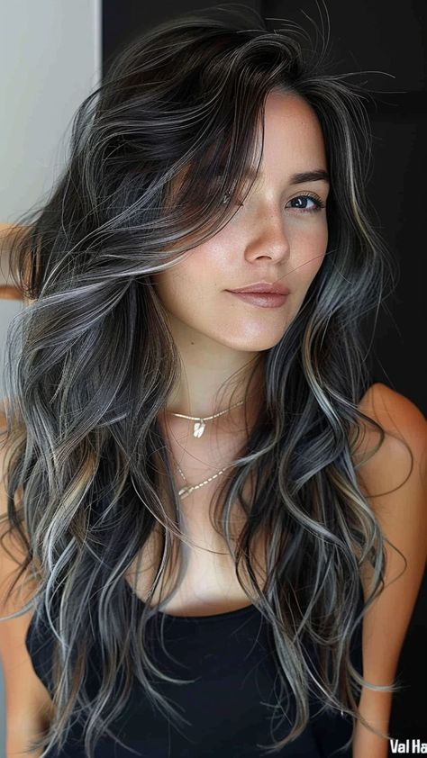 Silver Symphony: 25 Trendy Silver Hair Color Ideas for Your Stunning Look Black And Grey Balayage Hair, Dark Hair Grey Streak, Grey Balayage Black Hair, Long Dark Hair With Gray Highlights, Subtle Gray Highlights On Dark Hair, Silver Hair Brunette, Black Hair With Few Highlights, Accent Hair Streak, Silver Dark Hair