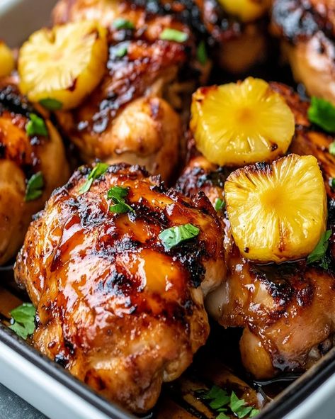 Baked Huli Huli Chicken with a sweet and savory pineapple glaze. This easy Hawaiian recipe is perfect for a delicious family dinner Hawaiian Baked Huli Huli Chicken, Chicken Huli Huli Recipe, Sheet Pan Teriyaki Chicken And Pineapple, Aloha Chicken Casserole, Hawaiian Chicken With Pineapple, Sweet Pineapple Chicken, Chicken Thigh Recipes With Pineapple, Baked Huli Huli Chicken Recipe, Baked Huli Huli Chicken Thighs