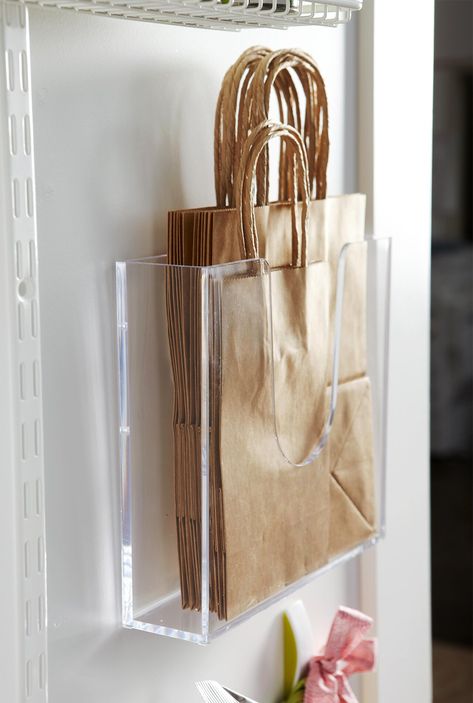 back-of-door-storage-paper-bags-24938e3c Kitchen Organization Ideas Dollar Store, Dollar Store Organizing Kitchen, Small Boutique Interior Design, Small Boutique Interior, Bag Storage Ideas, Interior Boutique, Kitchen Organization Ideas, Store Design Boutique, Boutique Interior Design