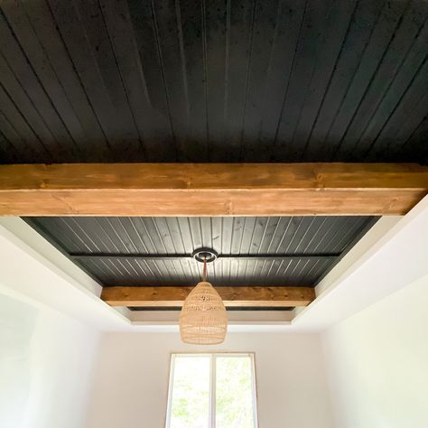 Looking for ideas to turn your tray ceiling into a focal point? By simply adding beams and carsiding, you can change the look of an entire bedroom, family room, kitchen, etc. Check out this post for a full DIY tutorial on how to turn your tray ceiling into a statement. Wood Beam Tray Ceiling, Half Vaulted Ceiling With Beams, Basement Tray Ceiling Ideas, Tiny Home Rustic Interior, Wood Ceiling Makeover, Adding Wood To Ceiling, Dining Room Tray Ceiling Ideas, Shiplap Entire Room, Painted Wood Ceiling With Beams