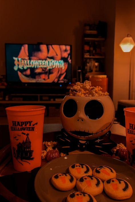 Halloweentown movie night with snacks. Halloween At Home Aesthetic, Halloween Is Cool Halloweentown, Snacks For Movie Night Aesthetic, Aesthetic Halloween Movie Night, Halloween Film Aesthetic, Halloween Aesthetic Movie Night, Outdoor Movie Night Halloween, Halloween Movie Set Up, Halloween Hang Out Ideas