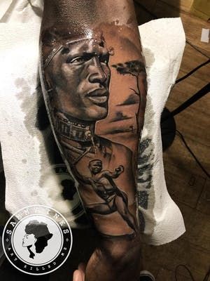 20 Powerful Africa Tattoos | Tattoodo Sankofa Tattoo, Adinkra Tattoo, African Warrior Tattoos, African Sleeve Tattoo, Dark Skin Tattoo, Tattoo Ideas Female Meaningful, Black Men Tattoos, African Warrior, Africa Tattoos