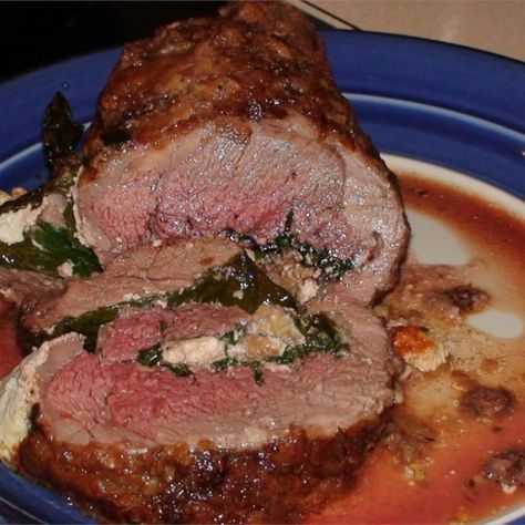 Stuffed Leg of Lamb | "Rolled leg of lamb stuffed with spinach, goat's cheese and pine nuts." #recipe #easter Stuffed Leg Of Lamb, Emeril Lagasse Recipes, Boneless Leg Of Lamb, Lamb Leg Recipes, Roast Lamb Leg, Lamb Leg, Leg Of Lamb, Lamb Dishes, Blue Plate