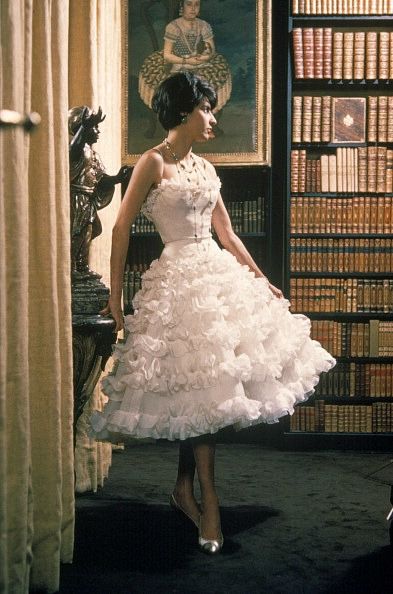 Model is wearing a frothy, tiered party dress by Chanel, 1960 Chanel 2020, 1960 Dress, Fashion 1960s, Mode Chanel, Chanel Dress, Look Formal, Chanel Couture, Vintage Fashion Photography, Diane Kruger