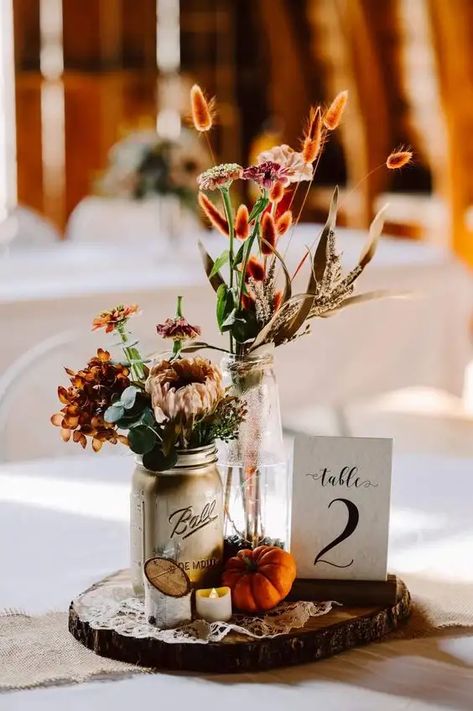 40+ Fall Wedding Ideas on a Budget We Love - HubPages November Farm Wedding, Fall Outdoor Wedding Centerpieces, Farm Fall Wedding, Fall Wedding Vibes, November Wedding Decor, October Wedding Centerpieces, Diy Fall Wedding Centerpieces, Fall Wedding Reception Ideas, Rustic Fall Wedding Ideas