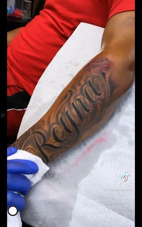 Name Tattoo Shaded, Parent Name Tattoos, Men Mom Tattoos, Forearm Tattoo Men Name, Mom Shoulder Tattoo Ideas, Last Name Arm Tattoo, Mom Names Tattoo Ideas, Mother Name Tattoo Ideas For Men, Mom Dedicated Tattoos