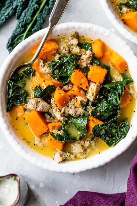 This Slow Cooker Creamy Sausage, Kale, and Sweet Potato Soup is a hearty, gluten-free, dairy-free soup you’ll want to add to your soup rotation! #soup #slowcooker #healthyrecipes #weightwatcherrecipes Sweet Potato Soup With Sausage, Potato Soup With Sausage, Soup With Sausage And Kale, Kale Sweet Potato Soup, Sausage Slow Cooker, Soup With Sausage, Sausage Potato Soup, Sausage And Kale Soup, Sausage And Kale