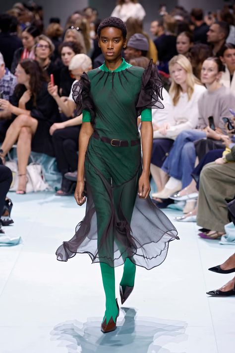 At Prada Spring 2025, a Mashup of Eras & Elegance With Edge Prada Spring 2025, Prada Runway, Milan Fashion Week Runway, Letitia Wright, Black Sheer Dress, Prada Spring, Spring 2025, Camisole Dress, Miuccia Prada