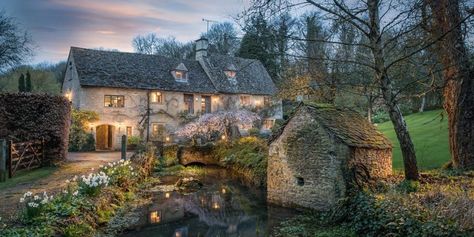 We Can't Decide If This 14th Century Cottage Is Magical, Charming or Both  - HouseBeautiful.com Bourton On The Water, Cotswolds Cottage, Stone Cottages, Quaint Cottage, Timeless Interiors, Cottage In The Woods, Thatched Cottage, Thatched Roof, Short Break