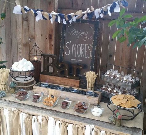 Rustic S'mores Bar | CatchMyParty.com Graduation Party Photo Backdrop, Smores Bar Wedding, Smores Bar Party, Graduation Party Planner, Smores Station, Smores Bar, Summer Bbq Recipes, Bonfire Party, Graduation 2024